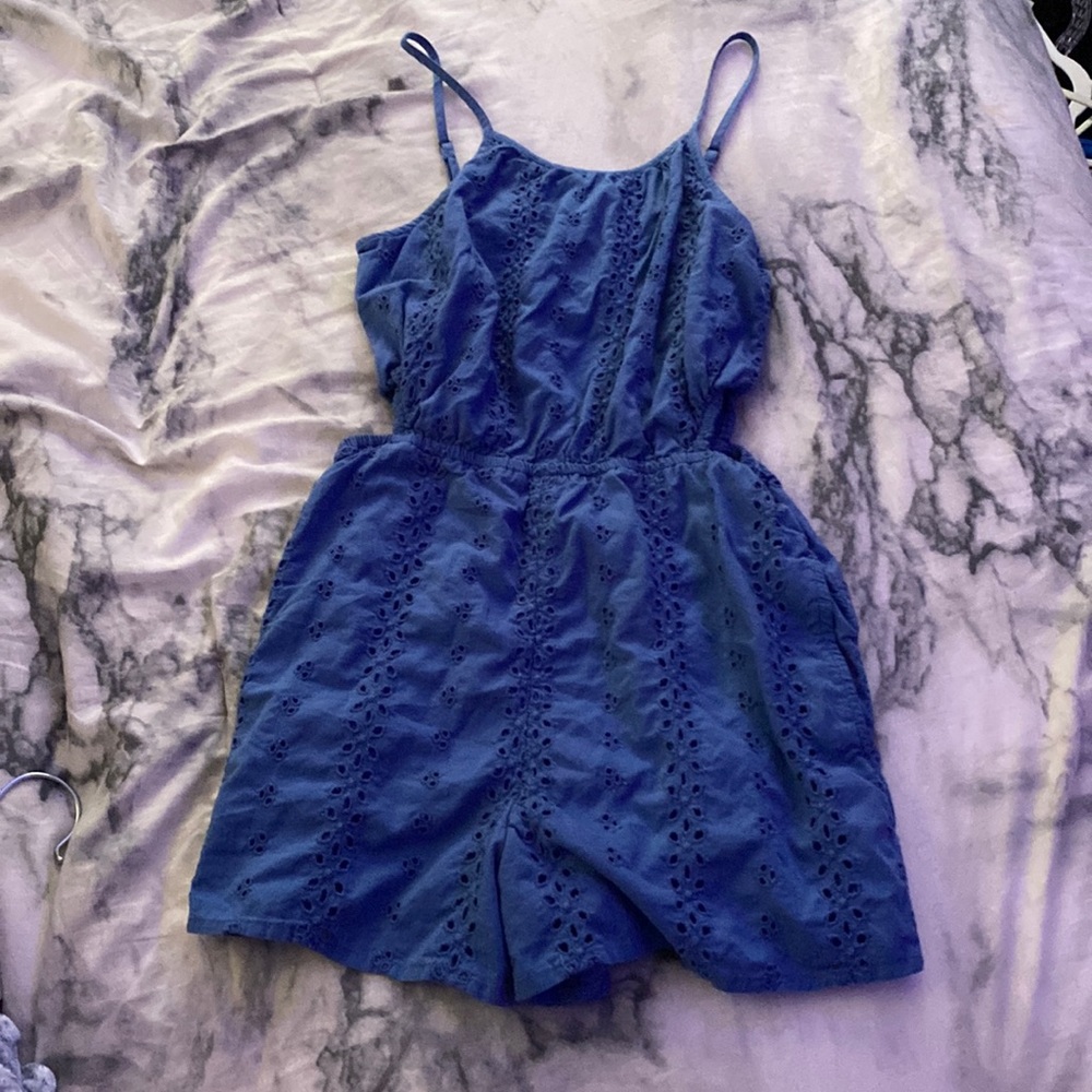 This is a textured, blue romper from Abercrombie kids.
